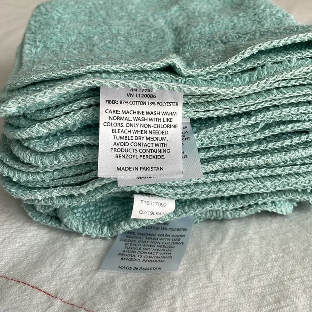 Set of 6 mint/aqua colored washcloths.